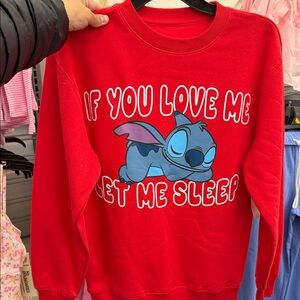 Red Sweatshirt with Sleeping Character Design